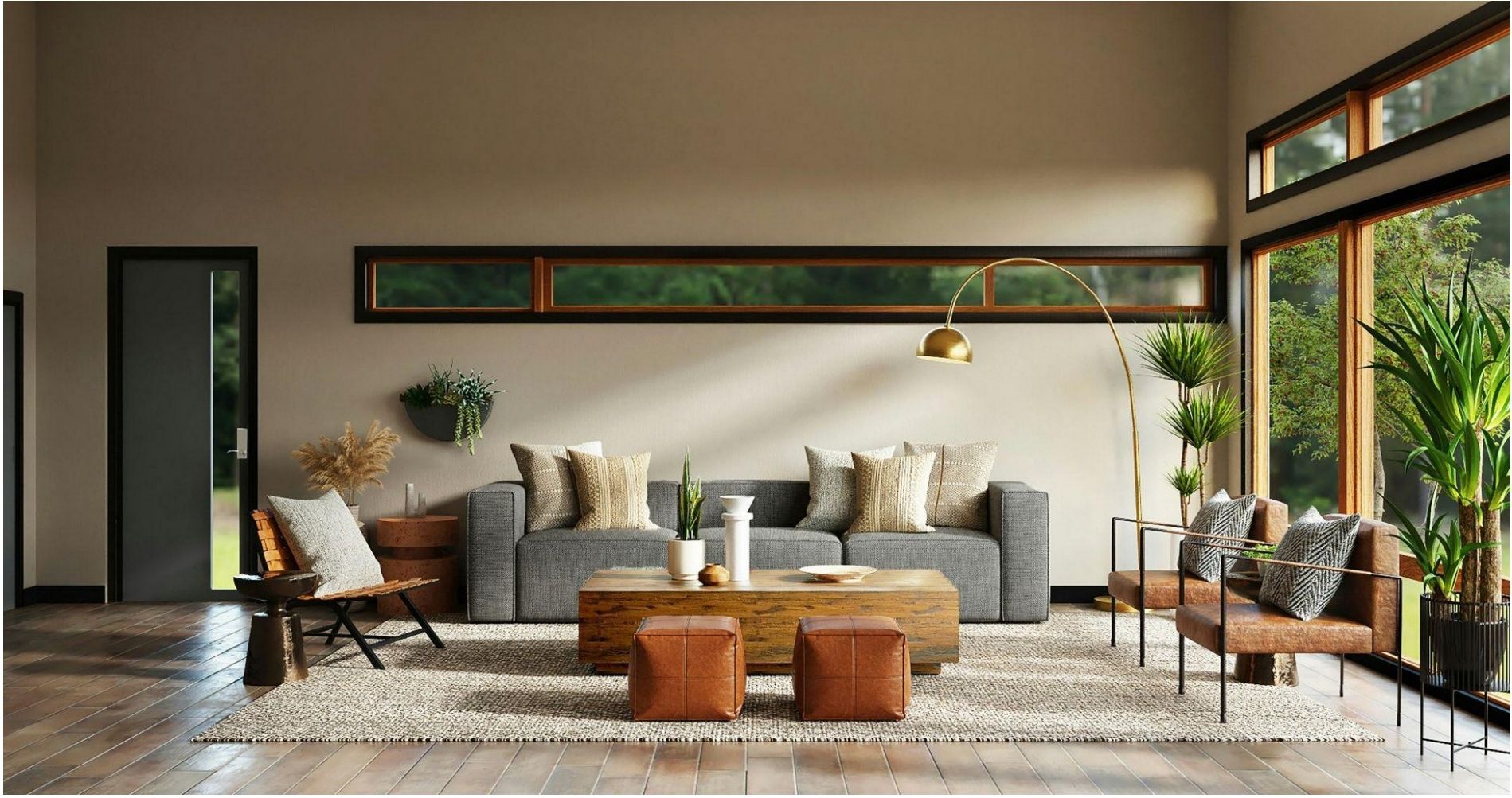 A modern living room with appropriately scaled furniture, including a grey sofa, wooden coffee table, leather ottomans, and armchairs, arranged on a rug in front of large windows